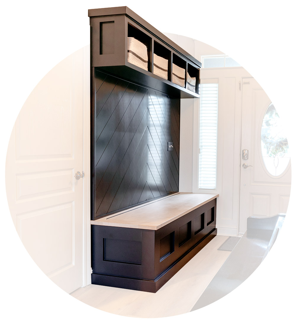 Custom entry way cabinets built to fit the style of the home.