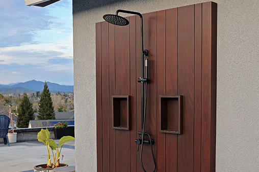 Custom built outdoor shower for pool area